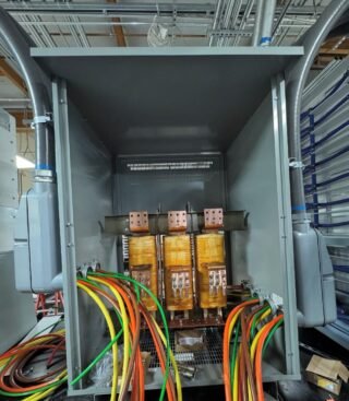 Commercial transformer with visible copper wiring during installation